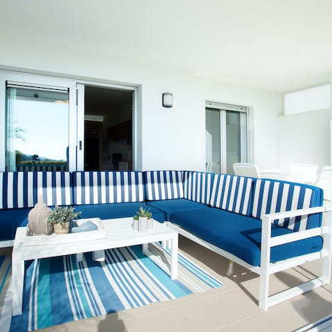Curl up with a book on your private patio