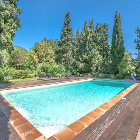 Slip into your swimwear and splash about in the home's swimming pool