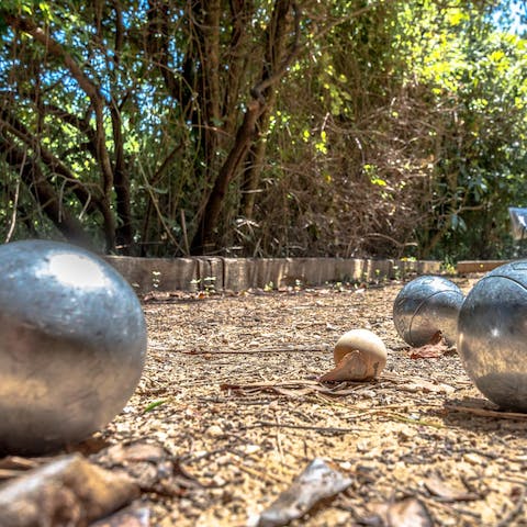 Get competitive on the pétanque court running down the side of the home