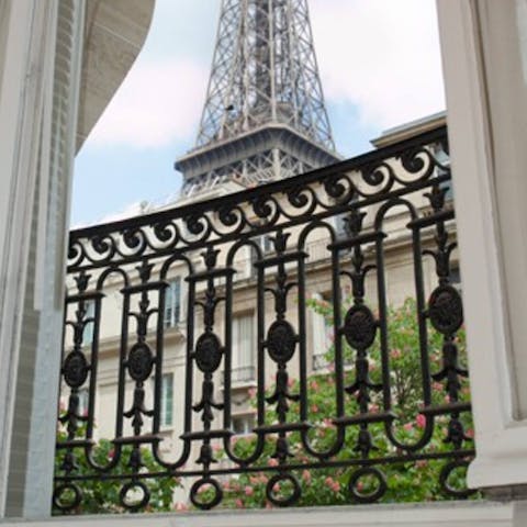 Admire the incredible, close-up views of the Eiffel Tower from your balconette