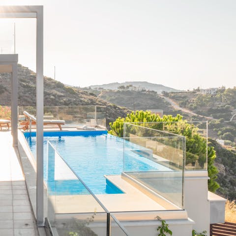 Swim a few lengths in the infinity pool to work off all the Cretan cuisine