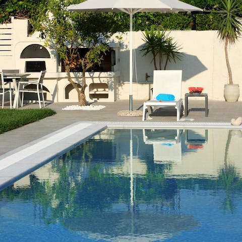 Take a dip in the private swimming pool 