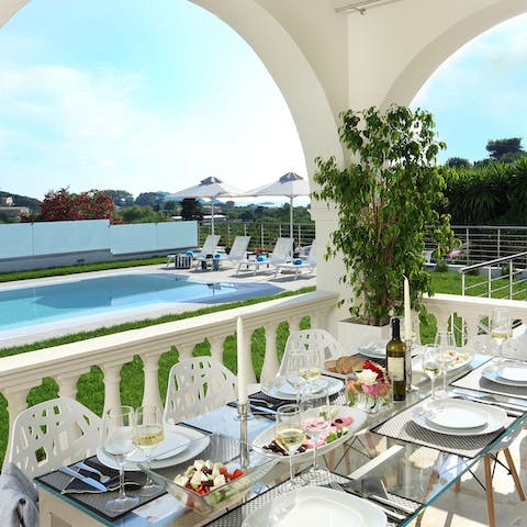Serve up some Greek delicacies at the alfresco dining area 