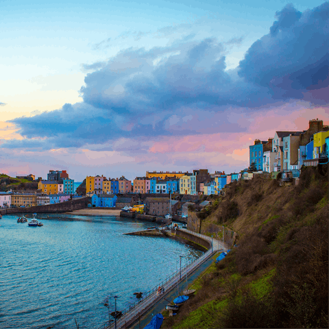 Stroll along the seafront promenade for an evening meal along Tenby's high street