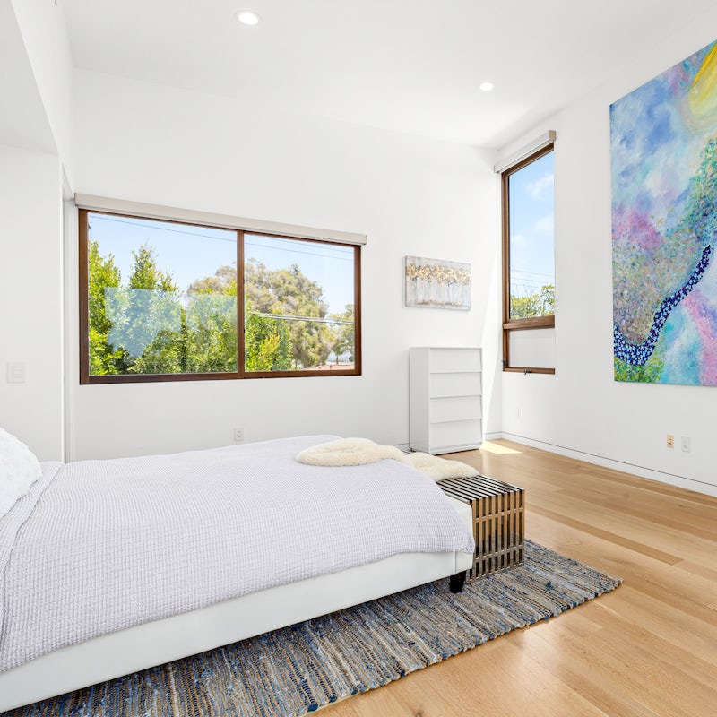 Wake up to leafy views and feel inspired by the calm simplicity of the bedrooms