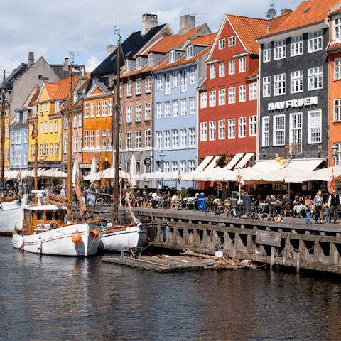 Admire the colourful building of Nyhavn habour – a short seven-minute walk away