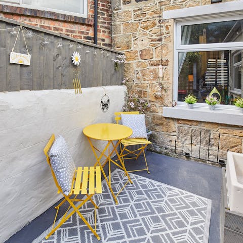 Relax under the sun with your morning cup of coffee in the garden