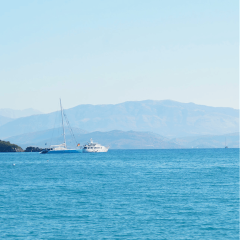 Explore the serene coves and charismatic towns of Corfu