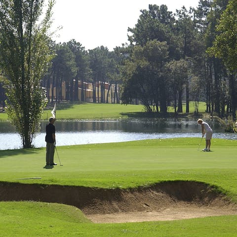 Get in a few games of golf on the on-site course
