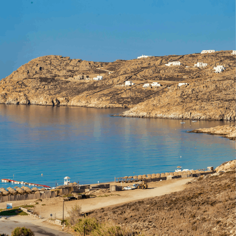 Head to Elia Beach for a day of sun, sand, and surf, just a ten-minute walk from home