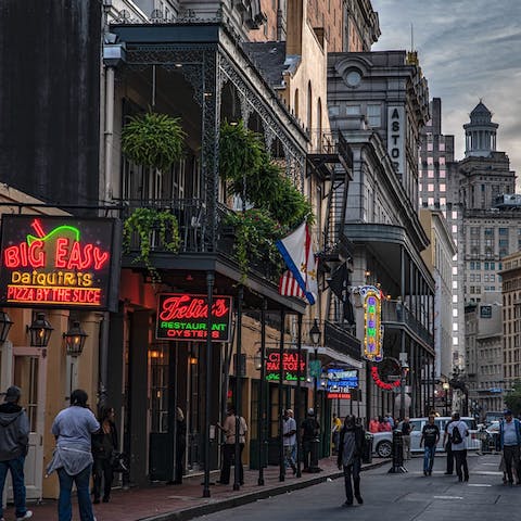 Stroll down the ever-lively Bourbon Street