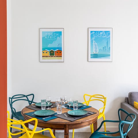 Gather together for a home-cooked meal in your bright and funky dining space