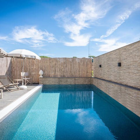 Sunbathe next to the communal pool or cool off with a dip in the water