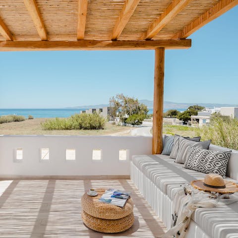 Settle down on the outdoor sofa with a good book and glorious sea views