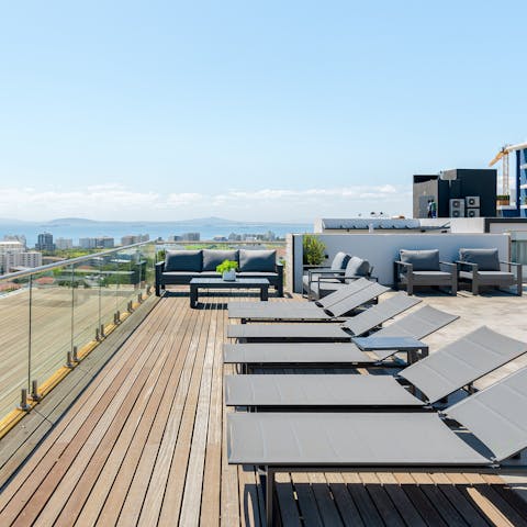 Admire ocean views from the shared rooftop terrace