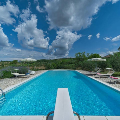 Dive into the private pool to cool off in the heat