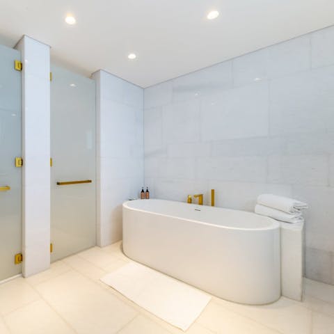 Indulge in the luxury of this home with a long soak in the tub