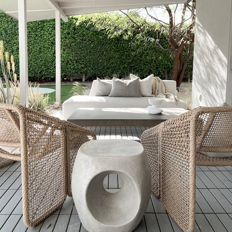 Seek solace from the midday sun in the covered outdoor seating area