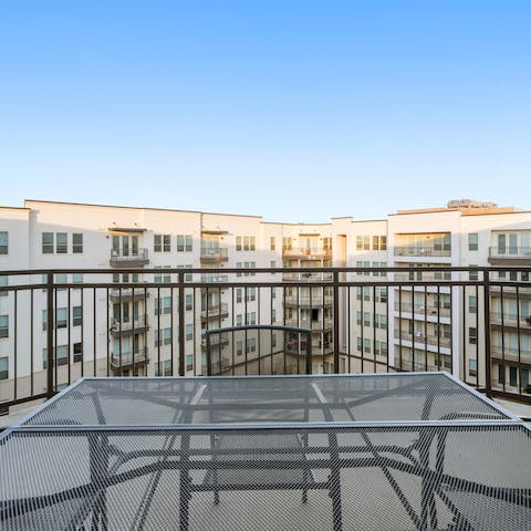 Look out over the courtyard pool from your private balcony