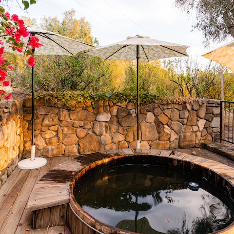 Embrace the natural elements with a long soak in the hot tub