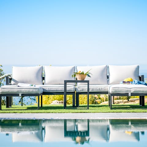 Sip your morning coffee on the comfy sofa by the pool