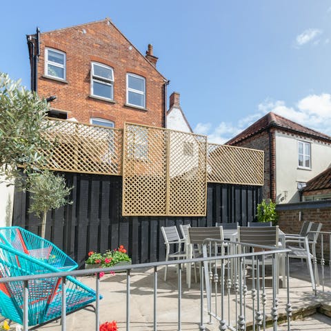 Soak up some sun in the split-level courtyard garden