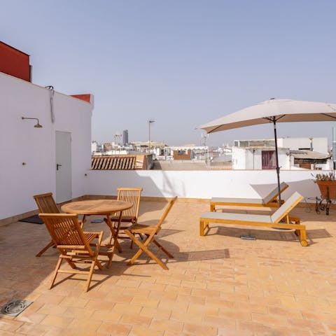 Soak up the Seville sunshine from your private roof terrace