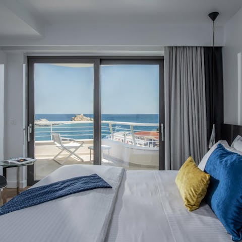 Wake up to glorious views of the Aegean from your bed