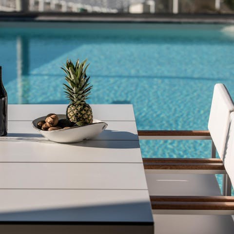 Enjoy poolside lunches with a gentle sea breeze