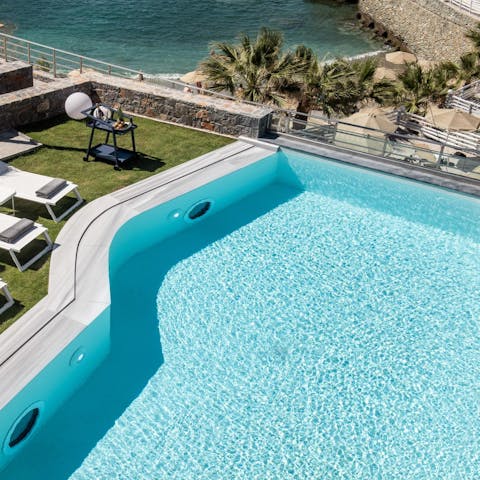 Start the day with a dip in the private swimming pool overlooking the sea