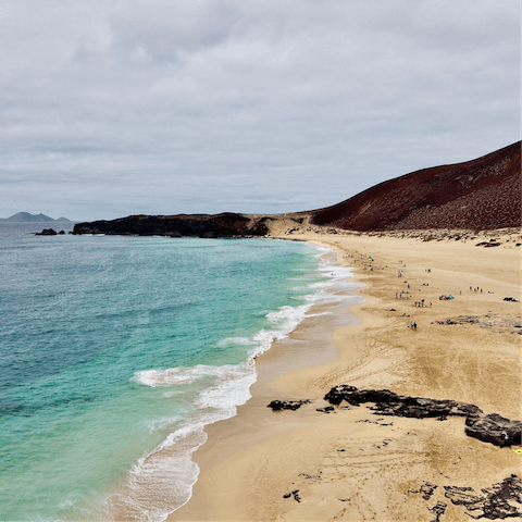 Meander up the coast towards the beaches – Playa Chica is a great spot