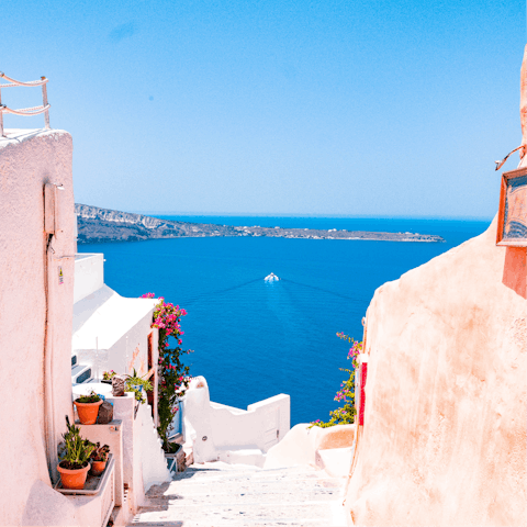 Meander through Oia's narrow, winding streets