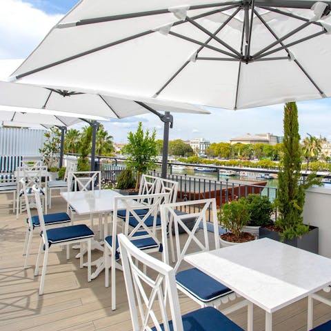 Enjoy a sangria on the shared roof terrace