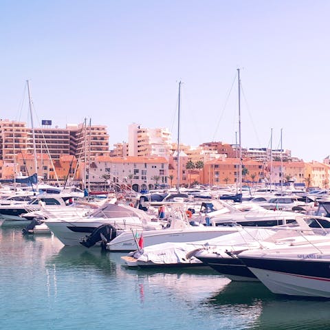 Wander along the marina of Vilamoura – only a six–minute drive away