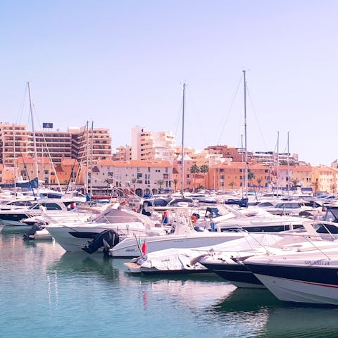 Wander along the marina of Vilamoura – only a six–minute drive away