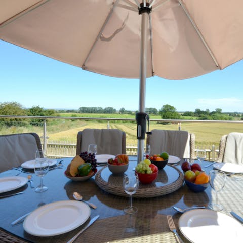 Sip wine al fresco as you overlook the Kent countryside