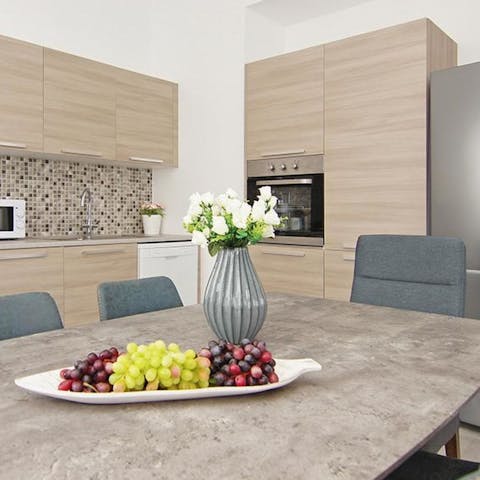Get the whole family together to enjoy breakfast in the bright kitchen and dining area 