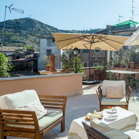 Admire mountain views from the shared terrace