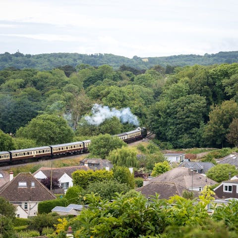 Watch the steam trains go by from your window