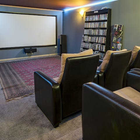 Gather in the private cinema room to enjoy cosy evenings of movies 