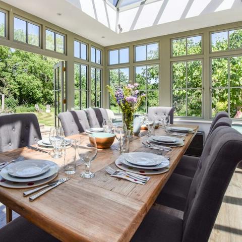 Serve a lavish meal in the light-filled conservatory