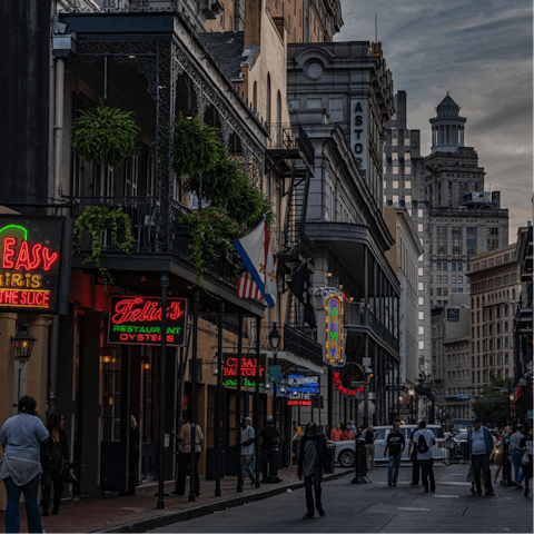 Enjoy an evening of live jazz at a  Bourbon Street bar, just a five-minutes away by car