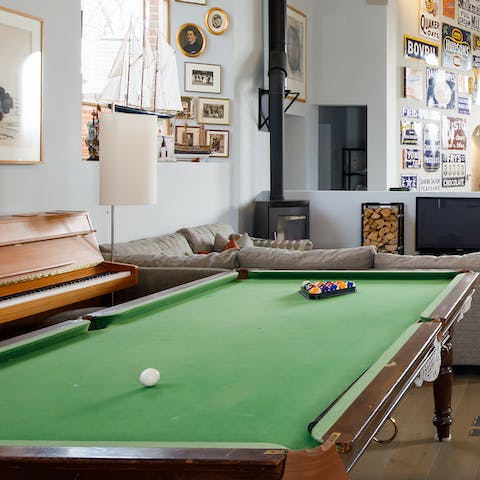 Play a game of snooker or tinkle the ivories on one of two pianos