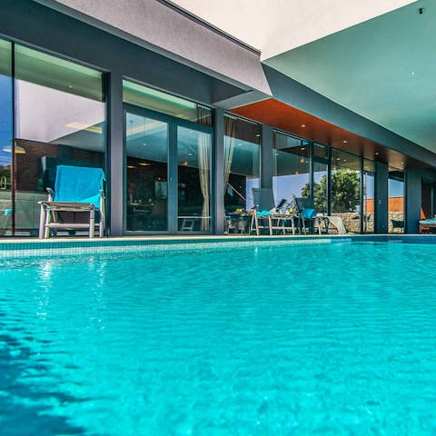 Cool off from the summer sun in the private swimming pool