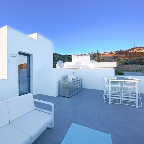 Head up to the rooftop terrace for a barbecue in the sun