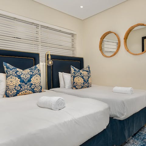 Get a restful night's sleep in the elegant bedrooms, ready for another beach day
