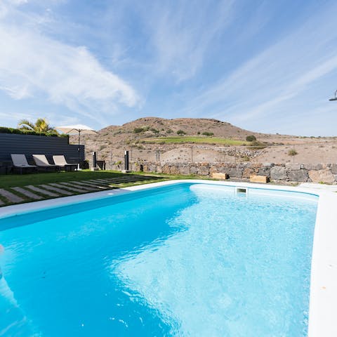 Unwind after a day playing golf with a dip in your private pool