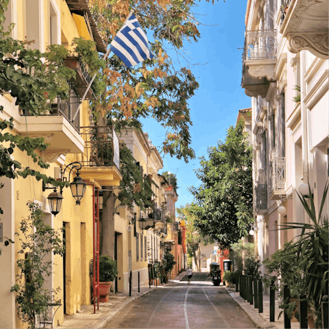 Stroll along the charming streets of Plaka, in the shadow of the Acropolis