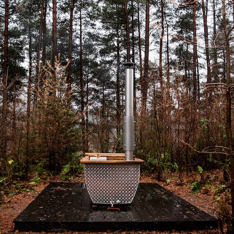 Enjoy the sweet sound of stillness from the wood–fired hot tub