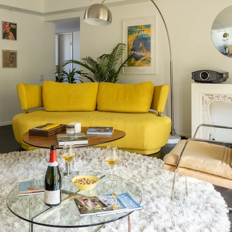 Settle in for a movie night on the elegant mid-century sofa
